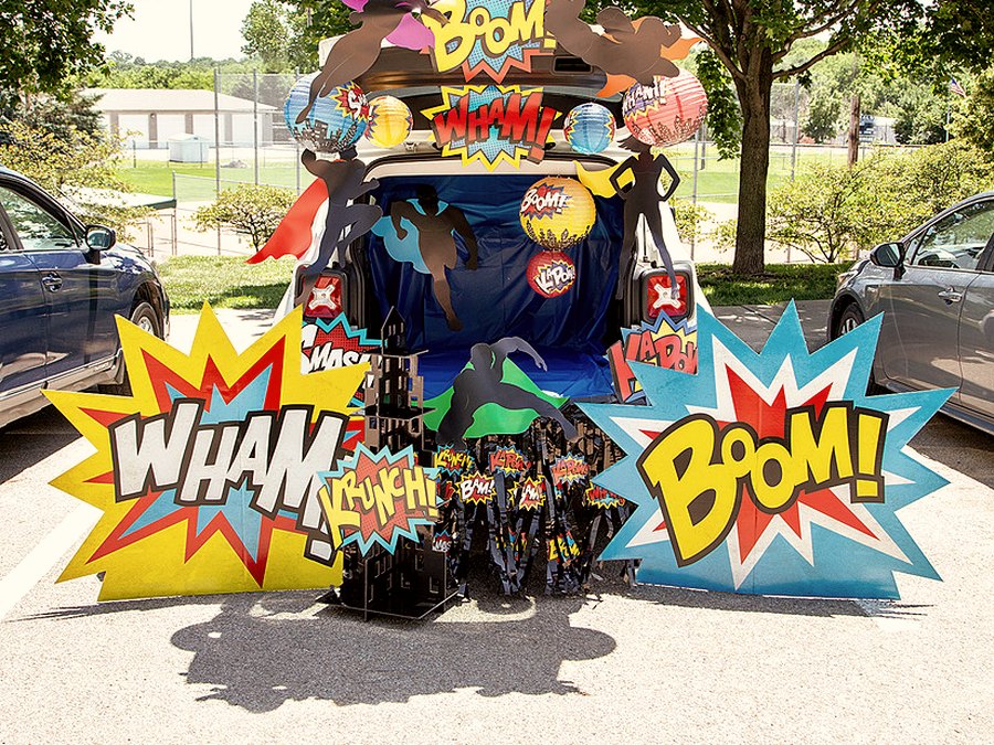 Superhero themed trunk with comic-book WHAM and BOOM signs